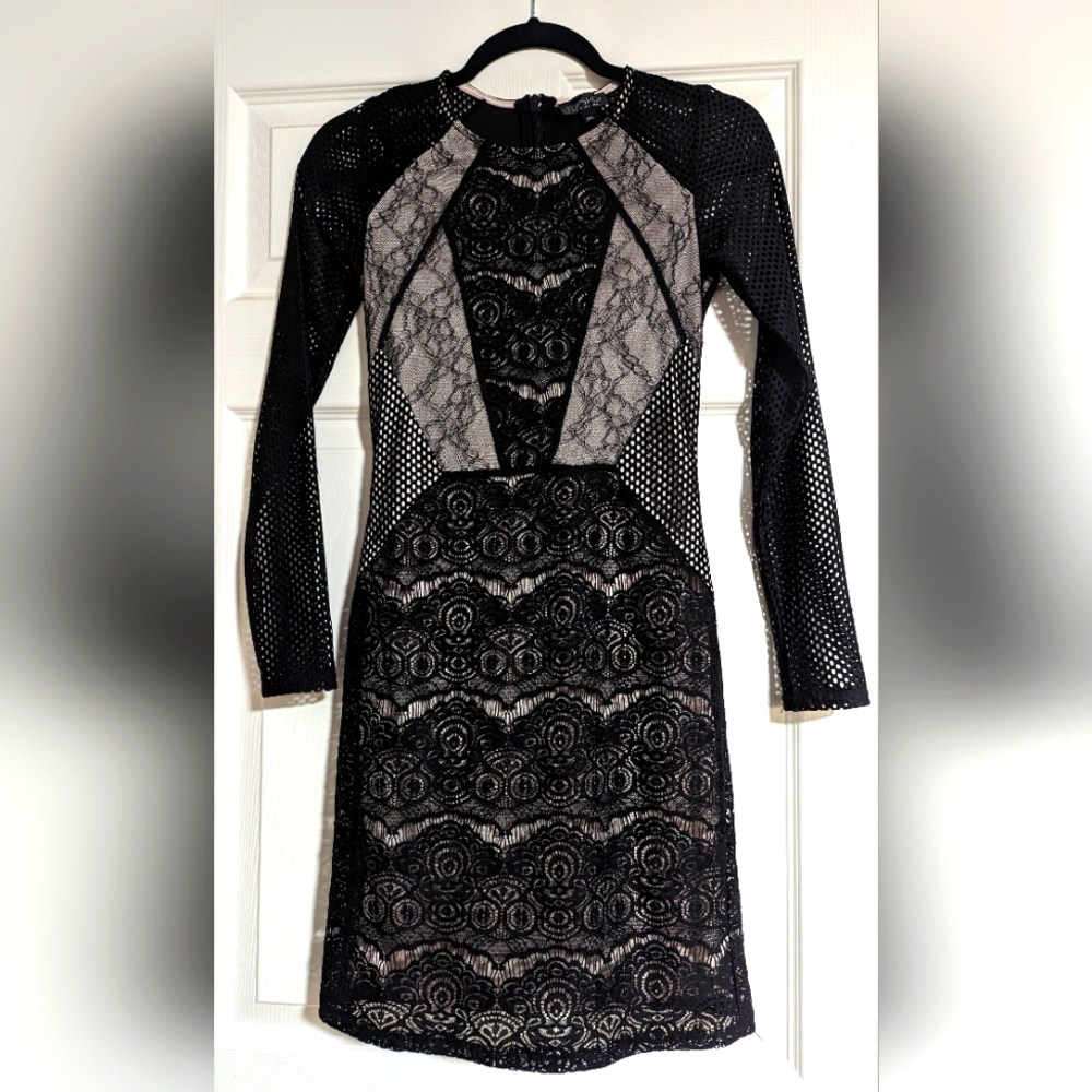 Topshop Minidress, size 2, black with tan lining on bodice,